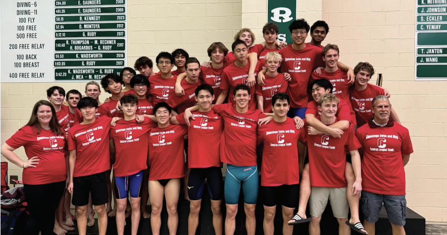 Raising the bar: The boys’ swim team poses with coach Mark Tirone (bottom right) for a photo after a record-breaking Central League meet. Tirone helped the team for 30 years and welcomed its new coach Jared Messics this season.